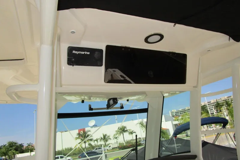 2020 Boston Whaler 330 Or @ Vallarta Yacht Photos Pics Boston Whaler 330 Outrage 2020 boat interior with Raymarine electronics.