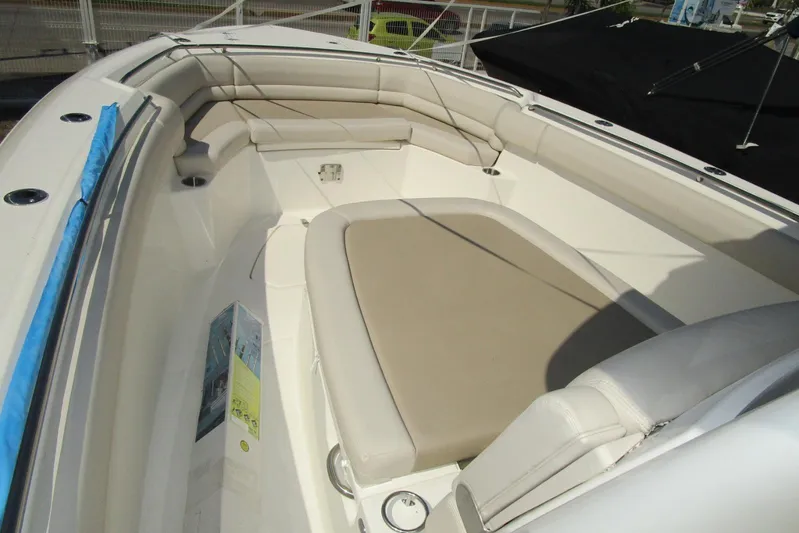 2020 Boston Whaler 330 Or @ Vallarta Yacht Photos Pics 2020 Boston Whaler 330 Outrage boat interior with cushioned seating area.