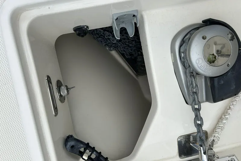 2020 Boston Whaler 330 Or @ Vallarta Yacht Photos Pics Anchor compartment of 2020 Boston Whaler 330 Outrage with chain and winch.