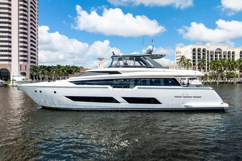 Alter Ego Yacht Photos Pics 2018 Ferretti Yachts 850 Motoryacht docked near luxury waterfront buildings.