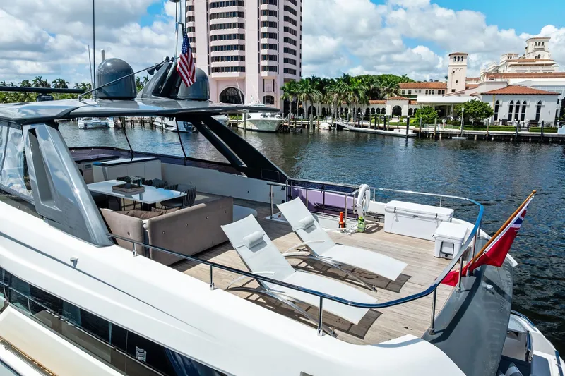 Alter Ego Yacht Photos Pics Luxurious 2018 Ferretti Yachts 850 Motoryacht docked by waterfront buildings.
