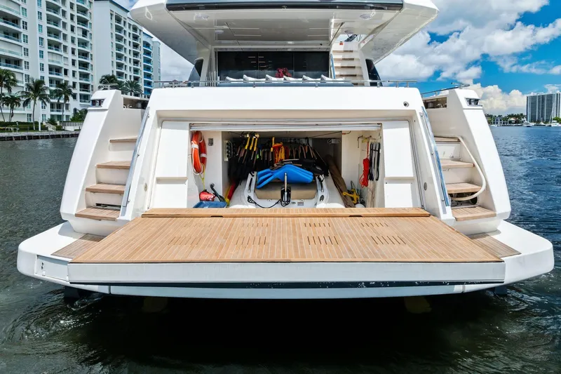 Alter Ego Yacht Photos Pics 2018 Ferretti Yachts 850 Motoryacht with open garage and water sports equipment.