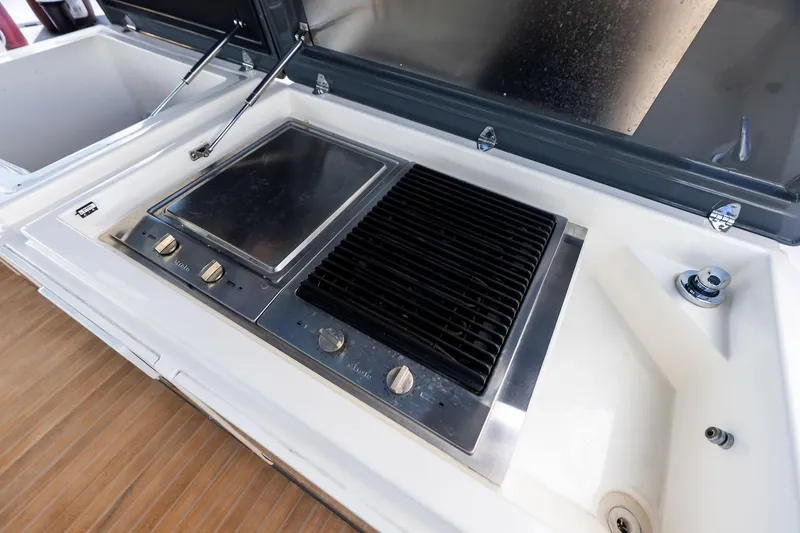 Alter Ego Yacht Photos Pics Outdoor grill on 2018 Ferretti Yachts 850 Motoryacht, featuring sleek stainless steel design.