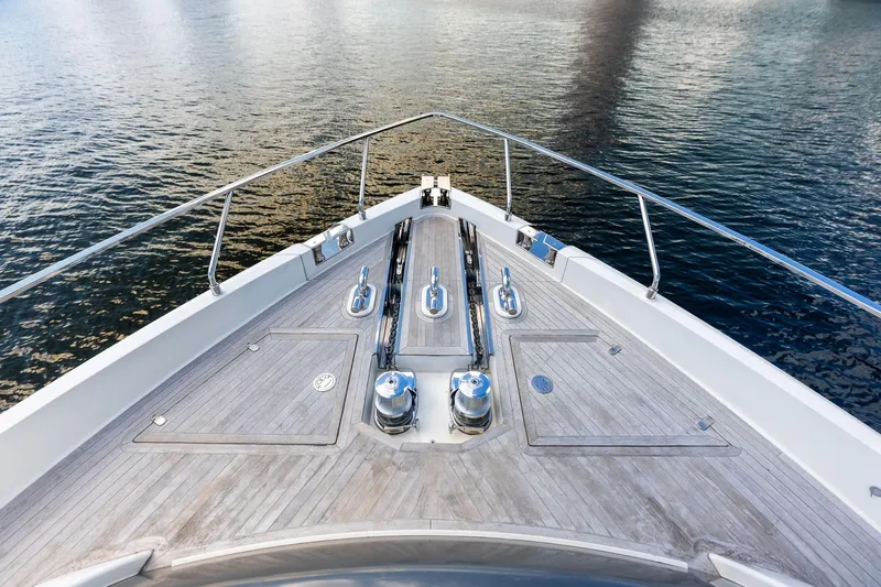 Alter Ego Yacht Photos Pics Bow of 2018 Ferretti Yachts 850 Motoryacht on calm water.