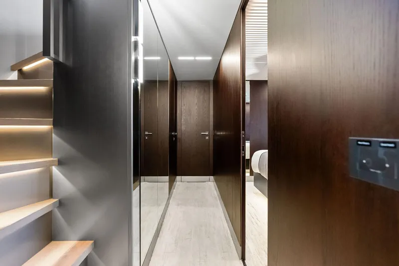 Alter Ego Yacht Photos Pics Luxurious interior of 2018 Ferretti Yachts 850 Motoryacht with modern wood paneling and sleek design.