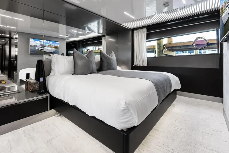 Alter Ego Yacht Photos Pics Luxurious bedroom interior of 2018 Ferretti Yachts 850 Motoryacht with modern design elements.