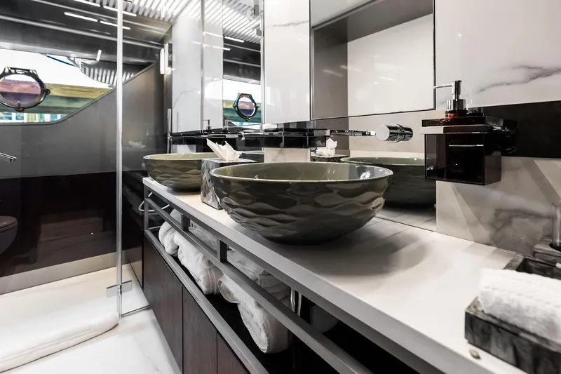 Alter Ego Yacht Photos Pics Luxurious bathroom on 2018 Ferretti Yachts 850 Motoryacht with modern sinks and elegant design.