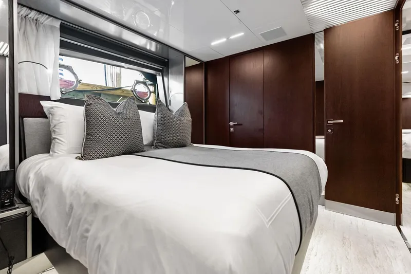 Alter Ego Yacht Photos Pics Luxurious bedroom interior of 2018 Ferretti Yachts 850 Motoryacht with elegant bedding.