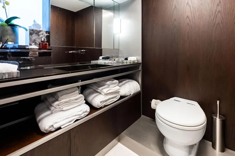 Alter Ego Yacht Photos Pics Luxurious bathroom in 2018 Ferretti Yachts 850 Motoryacht with modern fixtures and elegant design.