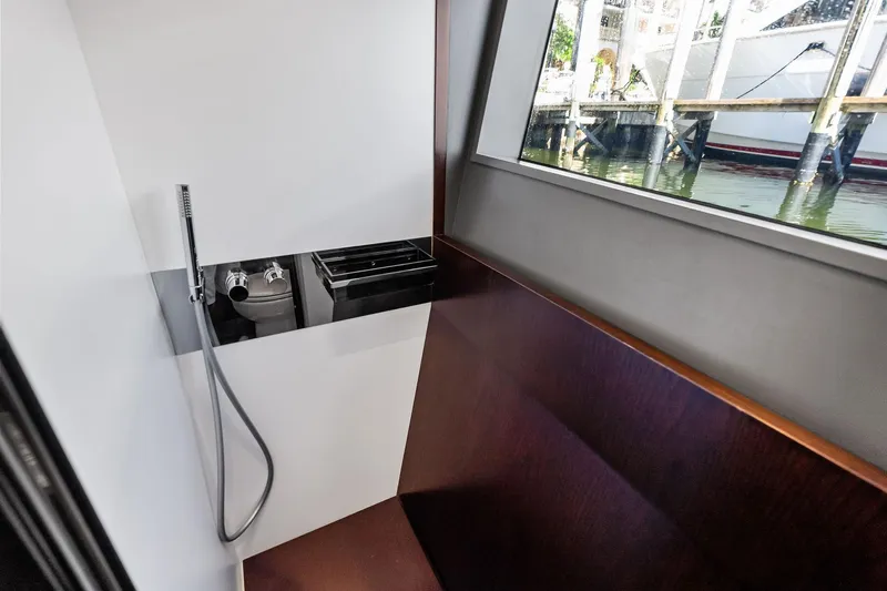 Alter Ego Yacht Photos Pics Interior of 2018 Ferretti Yachts 850 Motoryacht with modern shower and window view.