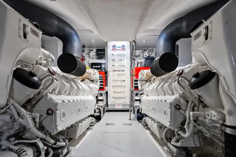 Alter Ego Yacht Photos Pics Engine room of 2018 Ferretti Yachts 850 Motoryacht with dual engines and control panel.