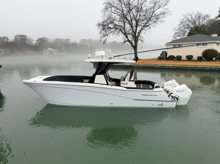  Yacht Photos Pics 2023 World Cat 280 CC-X boat on foggy lake.