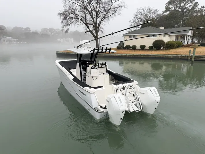  Yacht Photos Pics 2023 World Cat 280 CC-X boat on misty water.