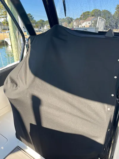  Yacht Photos Pics Covered seat on a 2023 World Cat 280 CC-X boat.