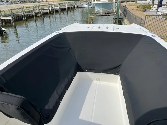  Yacht Photos Pics Interior view of 2023 World Cat 280 CC-X boat at dock.