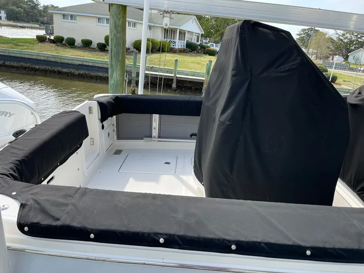  Yacht Photos Pics Interior of a 2023 World Cat 280 CC-X boat at dock.