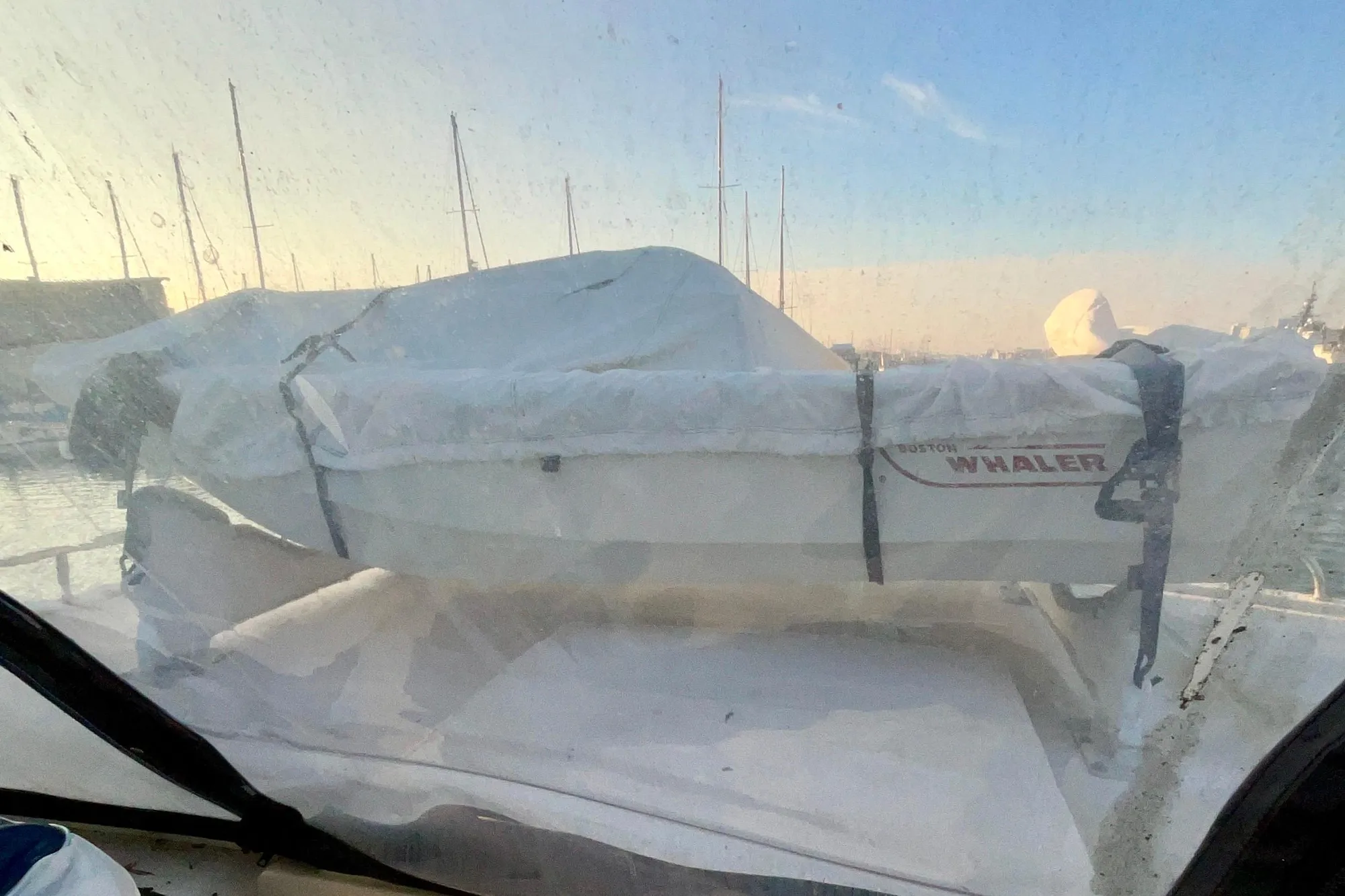 1987 Lien Hwa 47 Cockpit Motor Yacht with covered Boston Whaler on deck.