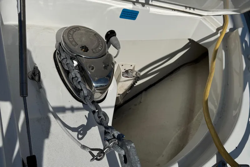 Plumper Yacht Photos Pics Anchor chain mechanism on a 2019 Jeanneau NC 895 boat deck.