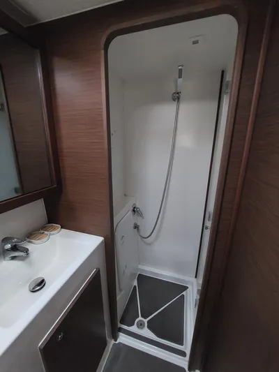 Kaya Yacht Photos Pics Modern shower area in 2021 Lagoon 42 yacht with sleek design and fixtures.