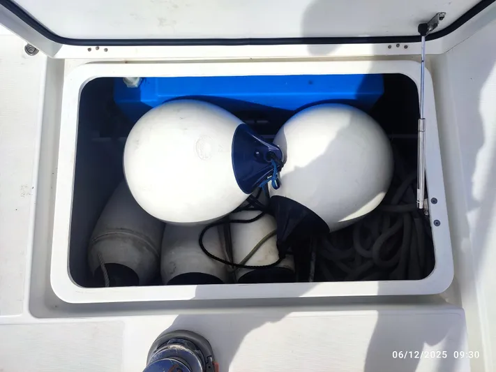 Kaya Yacht Photos Pics Storage compartment on Lagoon 42 yacht with fenders and ropes, 2021 model.