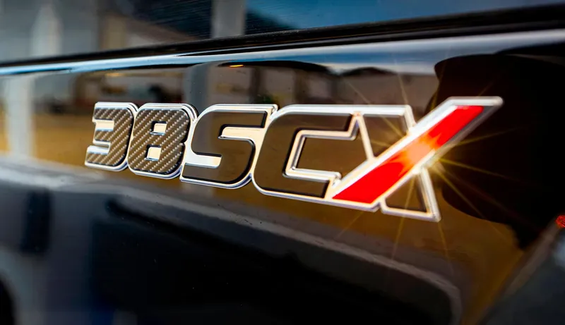  Yacht Photos Pics Close-up of 2025 Fountain 38 SCX logo with sleek, modern design.