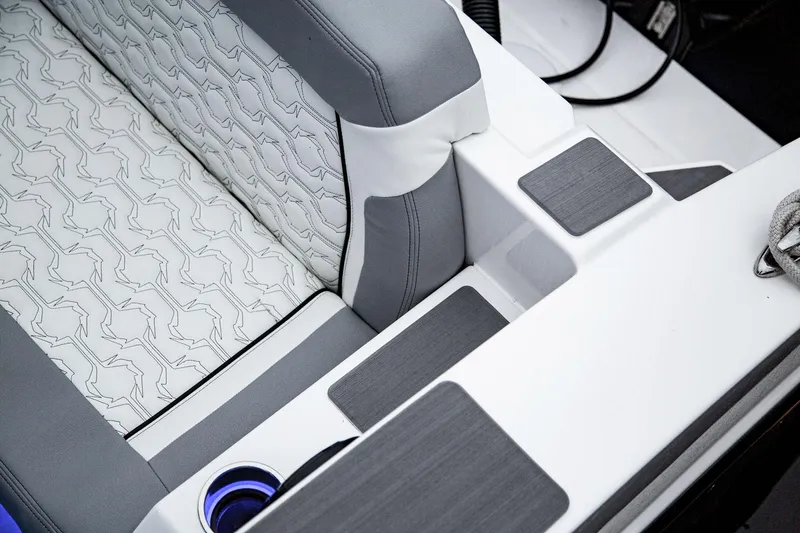  Yacht Photos Pics 2025 Fountain 38 SCX boat interior with stylish seating and cup holder.