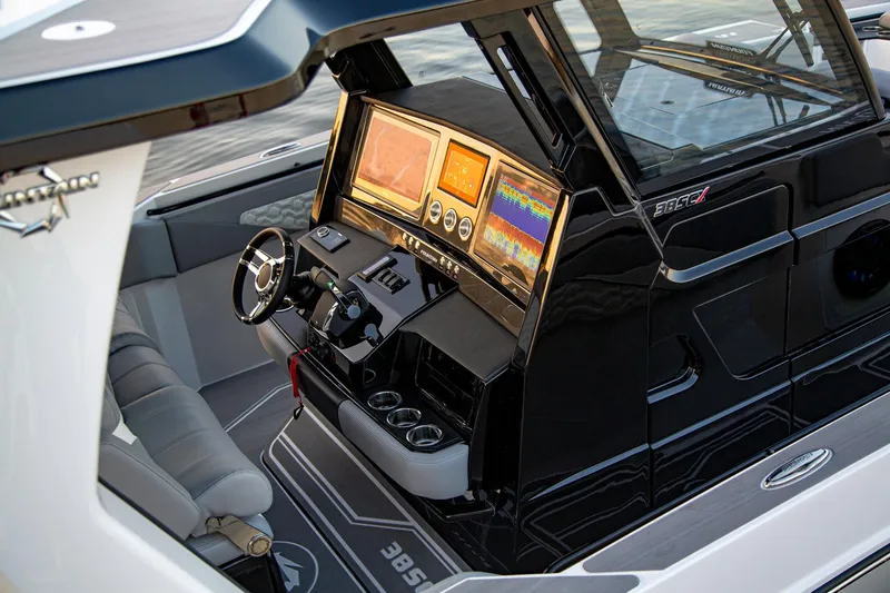  Yacht Photos Pics 2025 Fountain 38 SCX boat cockpit with advanced navigation displays.