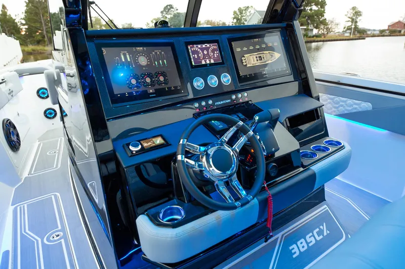  Yacht Photos Pics 2025 Fountain 38 SCX boat dashboard with advanced navigation controls and digital displays.