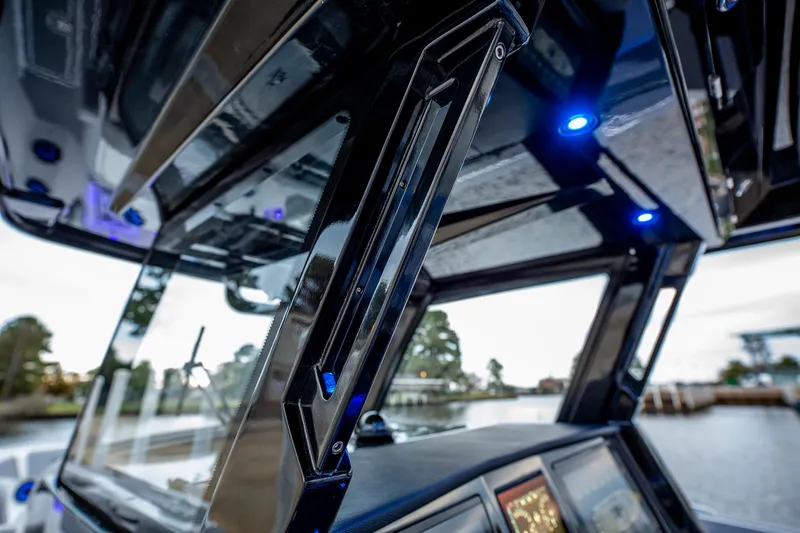  Yacht Photos Pics 2025 Fountain 38 SCX boat interior with modern design and blue LED lighting.