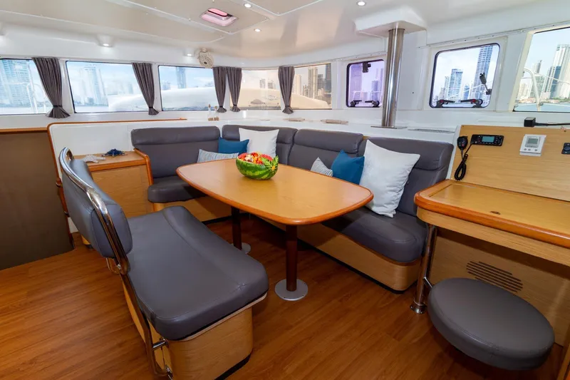 Agm26a09z3354 Yacht Photos Pics Luxurious interior of 2010 Lagoon 440 catamaran with modern seating and dining area.