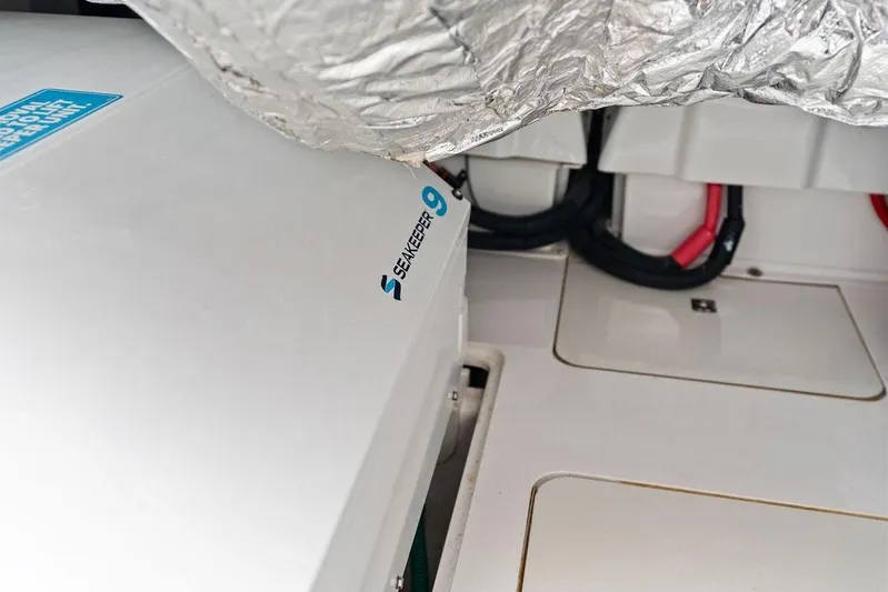 Hullabaloo Yacht Photos Pics Engine room of 2021 Princess V55 yacht featuring Seakeeper 9 stabilizer system.