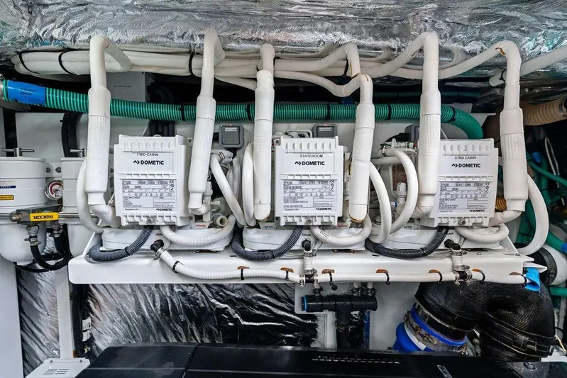 Hullabaloo Yacht Photos Pics Engine room of 2021 Princess V55 yacht with Dometic air conditioning units.