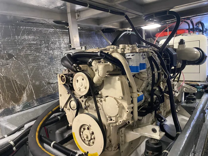 Coldwater Fusion Yacht Photos Pics Engine room of a 1998 Navigator 5300 Classic yacht, showcasing detailed machinery and components.