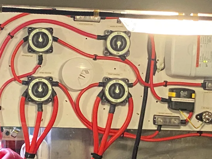 Coldwater Fusion Yacht Photos Pics Electrical panel with red cables and switches on a 1998 Navigator 5300 Classic.