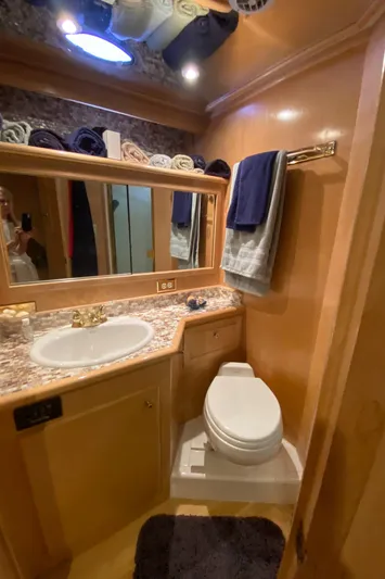 Coldwater Fusion Yacht Photos Pics Luxurious head in 1998 Navigator 5300 Classic yacht with elegant fixtures and ample storage.