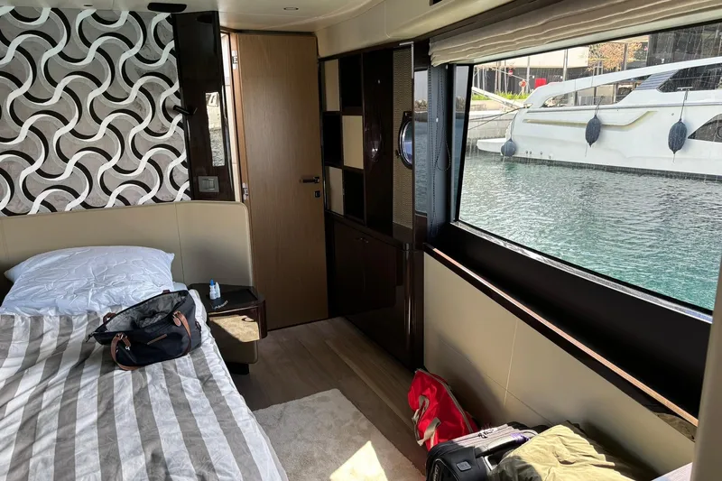  Yacht Photos Pics Luxurious interior of 2024 Absolute 60 Fly yacht with waterfront view.