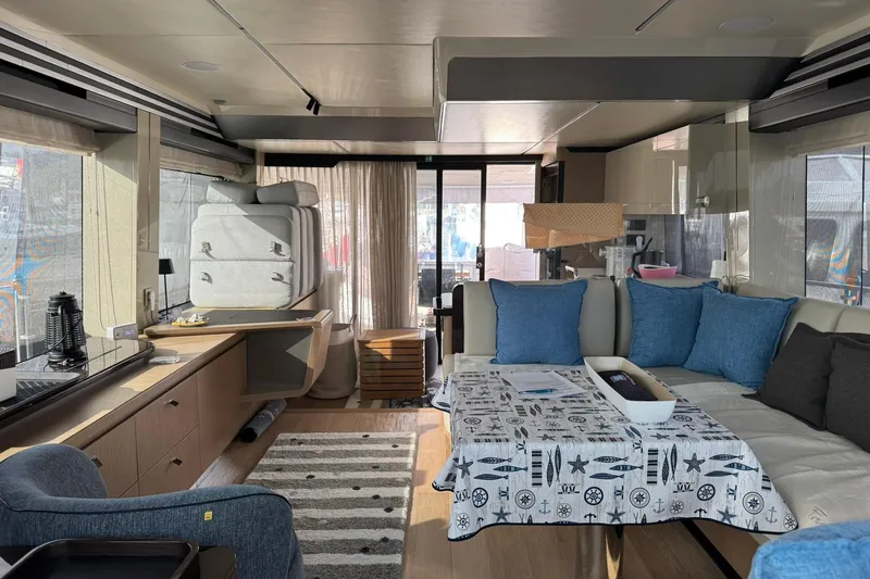  Yacht Photos Pics Luxurious interior of 2024 Absolute 60 Fly yacht with modern furnishings and elegant decor.