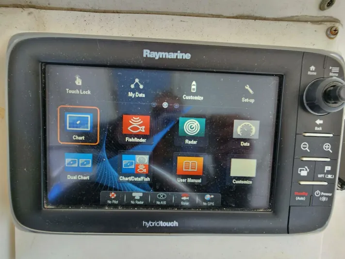  Yacht Photos Pics Raymarine HybridTouch display on 2000 Manta 42, showing navigation and fishfinder options.