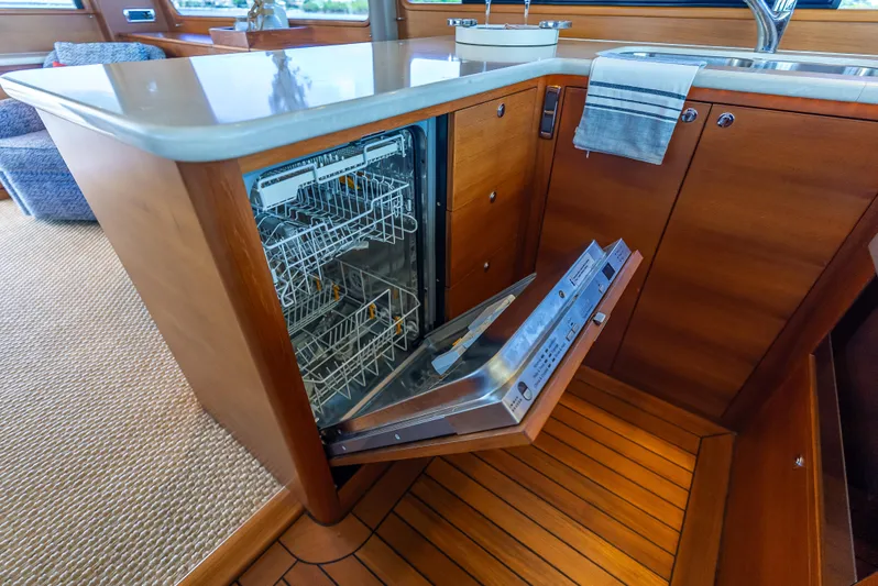 Tonic Yacht Photos Pics Luxury yacht kitchen with open dishwasher, Grand Banks GB60, 2018 model.