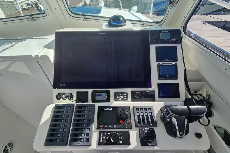  Yacht Photos Pics Steiger Craft 31 Miami 2021 boat dashboard with navigation and control systems.