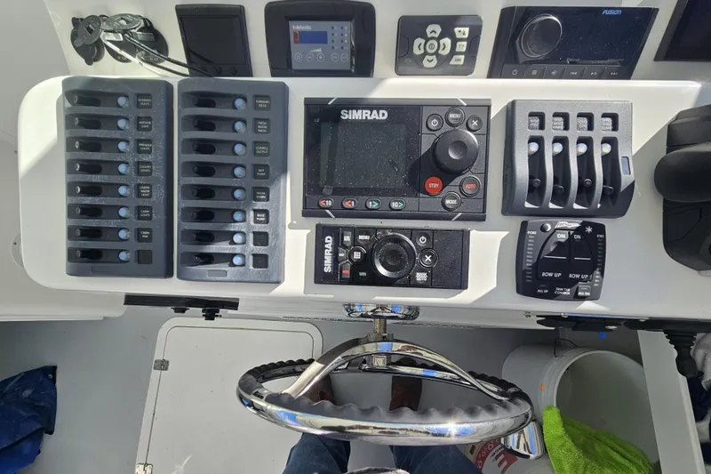  Yacht Photos Pics Steiger Craft 31 Miami 2021 dashboard with Simrad controls and switches.