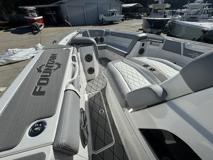  Yacht Photos Pics 2024 Fountain 38 SCX boat interior with luxurious seating and modern design.