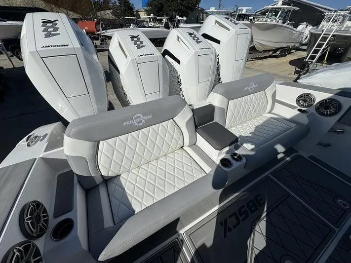  Yacht Photos Pics 2024 Fountain 38 SCX boat with quad Mercury outboard engines and luxurious seating.