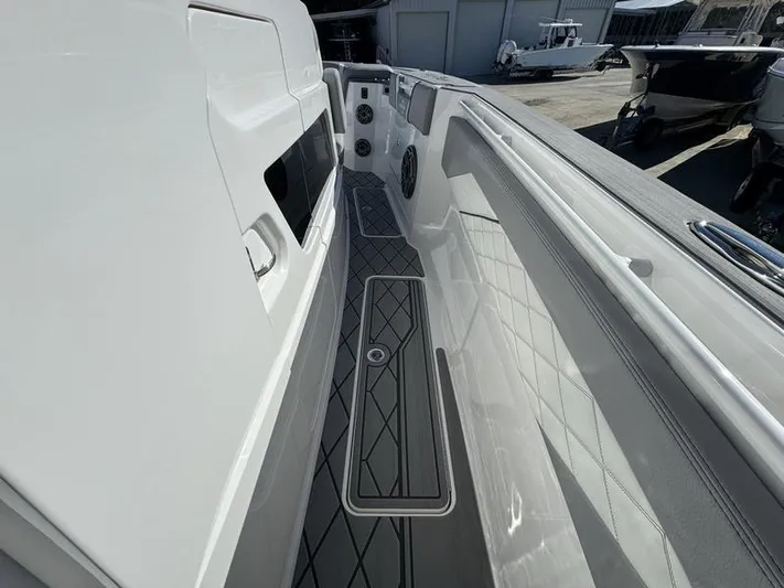  Yacht Photos Pics 2024 Fountain 38 SCX boat deck with sleek design and modern features.