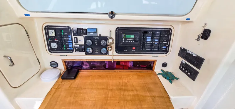 Makai Yacht Photos Pics Control panel of 1997 Voyage Mayotte 50 yacht with gauges and switches.