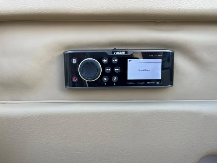 Grato Yacht Photos Pics Fusion marine stereo system on 2015 Chris-Craft 32 Launch boat dashboard.