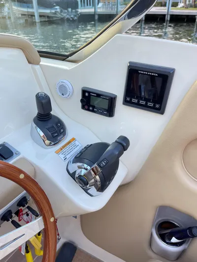 Grato Yacht Photos Pics Control panel of a 2015 Chris-Craft 32 Launch boat with navigation equipment.