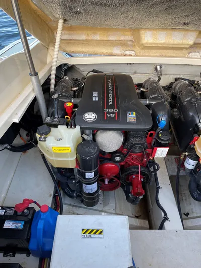 Grato Yacht Photos Pics Engine compartment of a 2015 Chris-Craft 32 Launch boat, featuring a powerful V8 engine.
