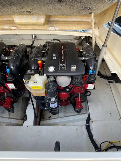 Grato Yacht Photos Pics Engine compartment of a 2015 Chris-Craft 32 Launch boat, featuring dual engines.