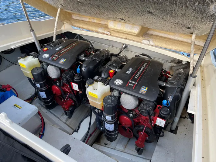 Grato Yacht Photos Pics Twin engines in a 2015 Chris-Craft 32 Launch boat, showcasing powerful marine engineering.